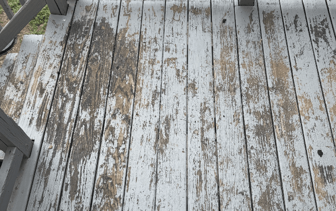 Weathered deck surface before repair or refinishing Weathered deck surface before repair or refinishing