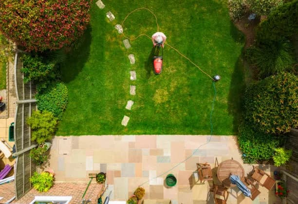 Mor Handy landscaping service trimming a Maryland residential yard Mor Handy landscaping service trimming a Maryland residential yard
